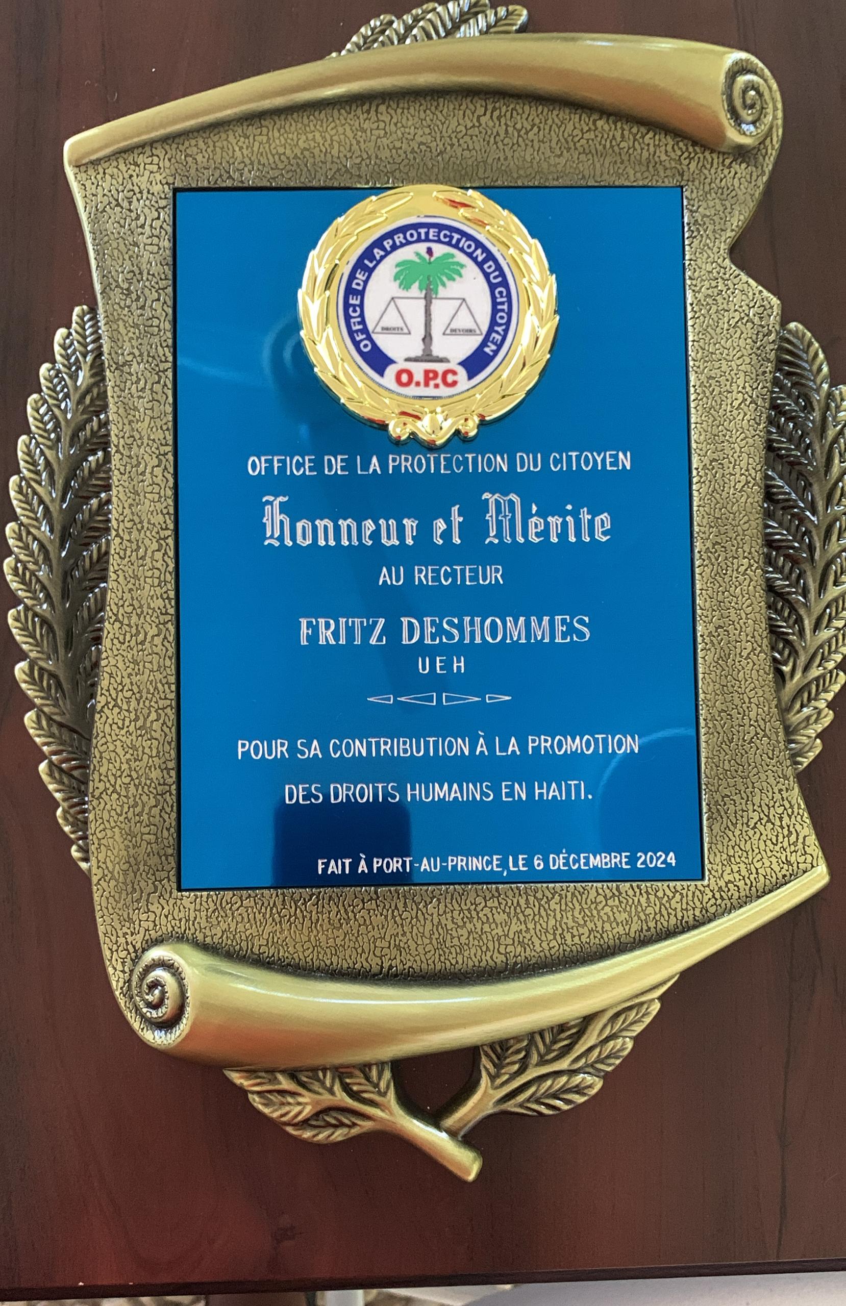 Le Recteur Fritz Deshommes honoré par l’Office de la Protection du Citoyen (OPC)